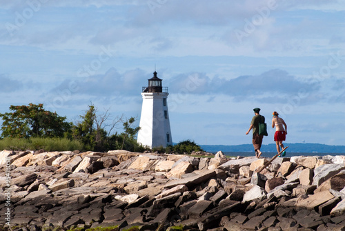 Friends Hiking to Black Rock Harbor Light in Bridgeport, Connecticut