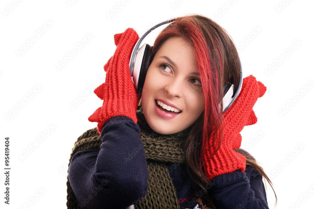 Portrait of a young girl with winter clothes and headphones Portrait of a young girl with winter clothes and headphones