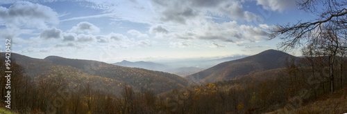 Panorama of fog in valley of Shenandoah National Park on sunny fall day.