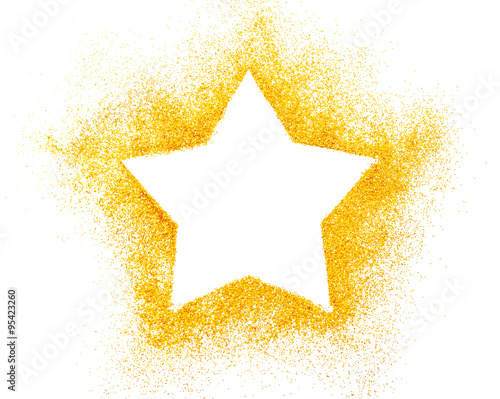 Christmas star decoration of golden confetti stars against white