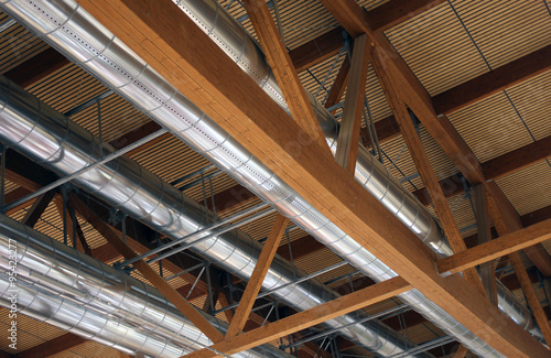 pipes of a heating and air-conditioning under the roof