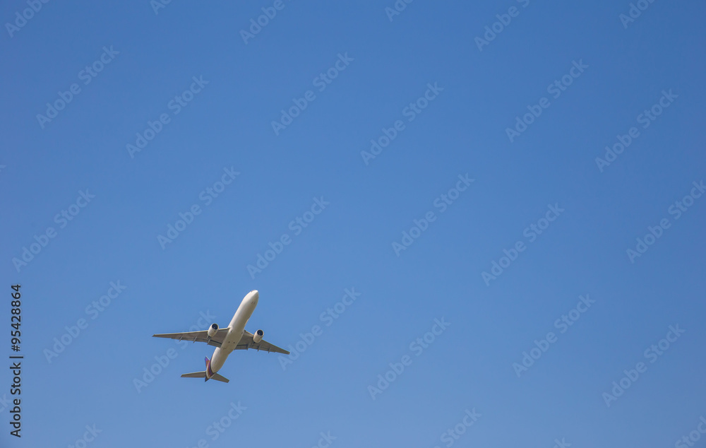 Airplane taking off at sky blue Airplane taking off at sky blue