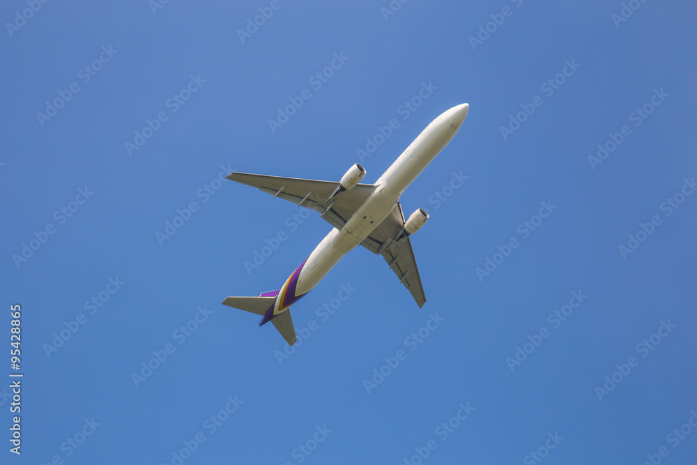 Airplane taking off at sky blue Airplane taking off at sky blue