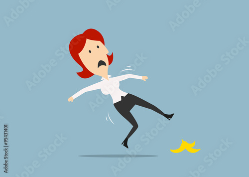 Businesswoman slipping on a banana peel