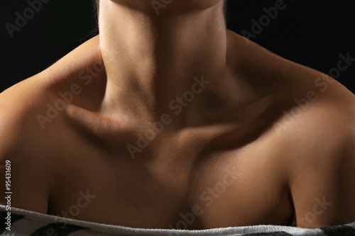 View on woman's neck, collarbone and shoulders, close-up