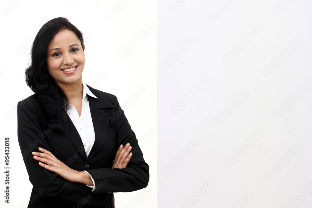 happy business woman showing blank signboard happy business woman showing blank signboard