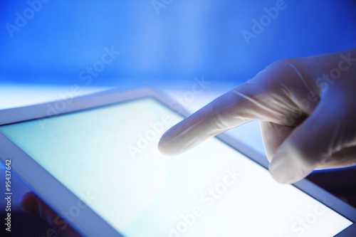 Doctor working with tablet-pc  close up