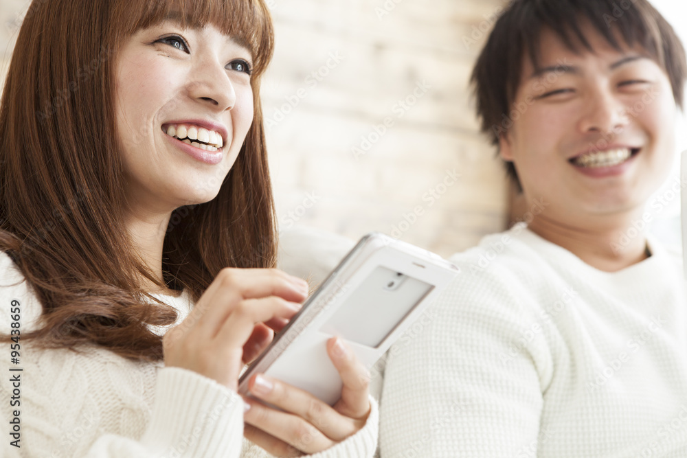 Young couple are relaxing at home Young couple are relaxing at home