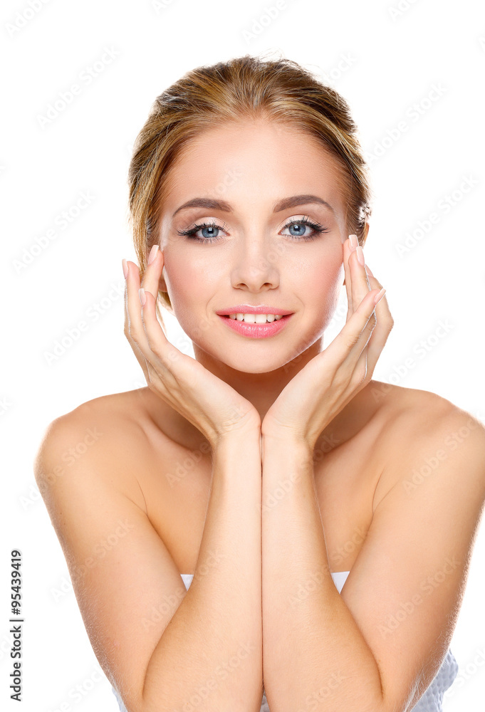 Young woman touching her face isolated on white background Young woman touching her face isolated on white background
