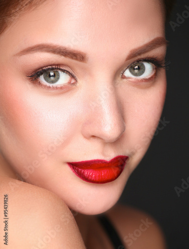 Close up portrait of beautiful young woman face