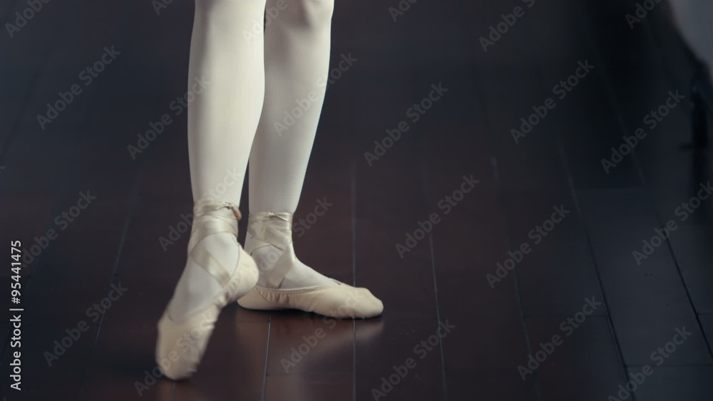 Female Ballet Dancer stretches and practices,dolly shot Female Ballet Dancer stretches and practices,dolly shot