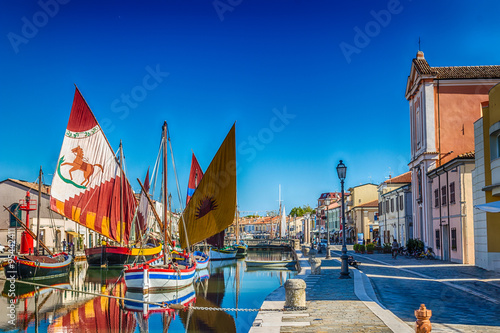 ancient sailboats on Italian Canal Port photo