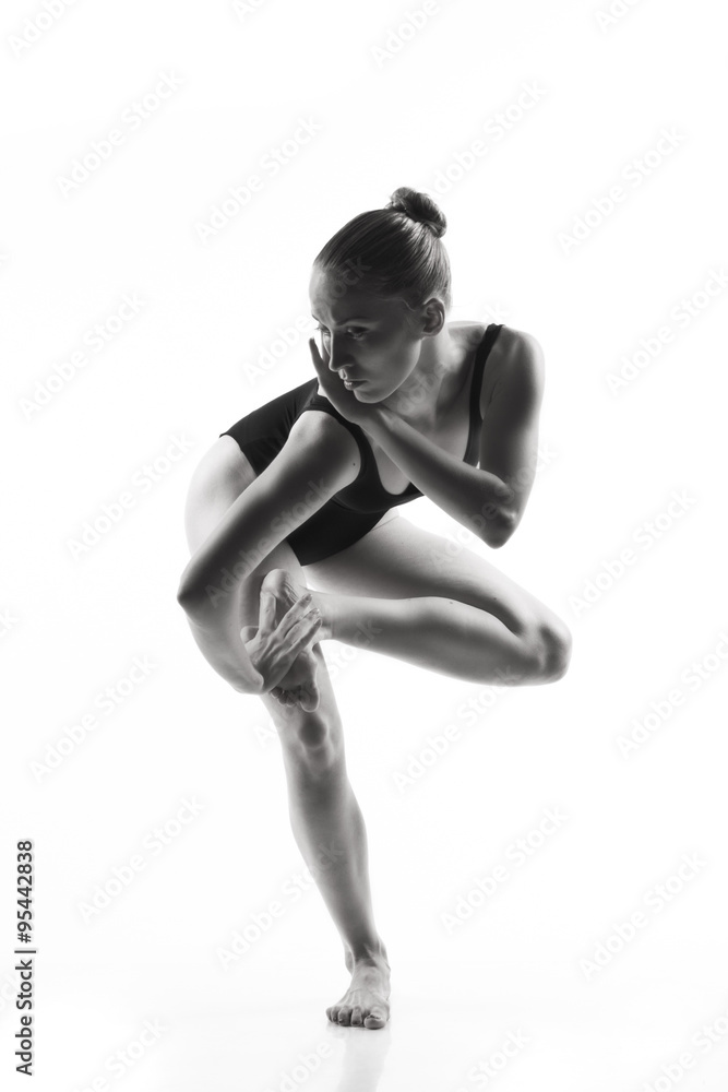 Modern ballet dancer posing on white background Modern ballet dancer posing on white background