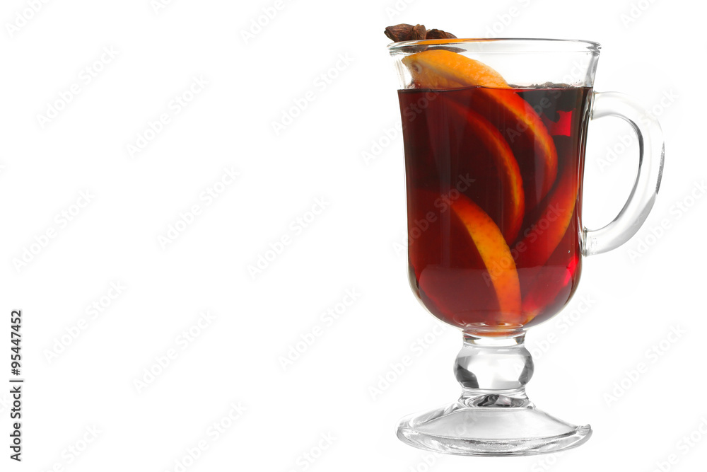 Cup with mulled wine and lemon slices and cinnamon with anise lying next to the bowl of honey on wooden table, on lights background Cup with mulled wine and lemon slices and cinnamon with anise lying next to the bowl of honey on wooden table, on lights background