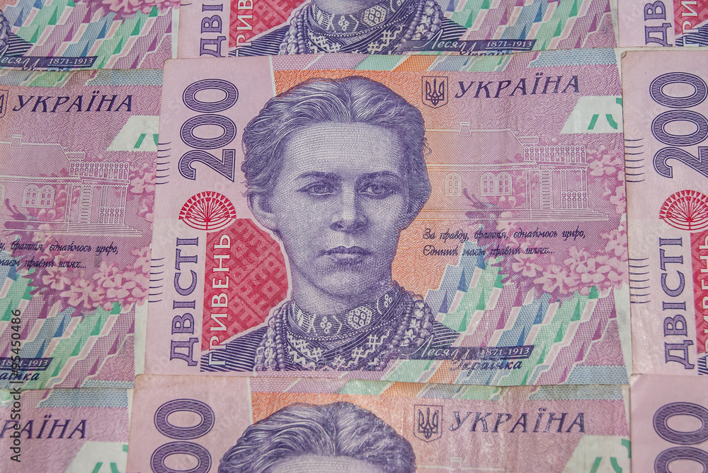 Pile of ukrainian money hryvnia, denomination of 200 UAH