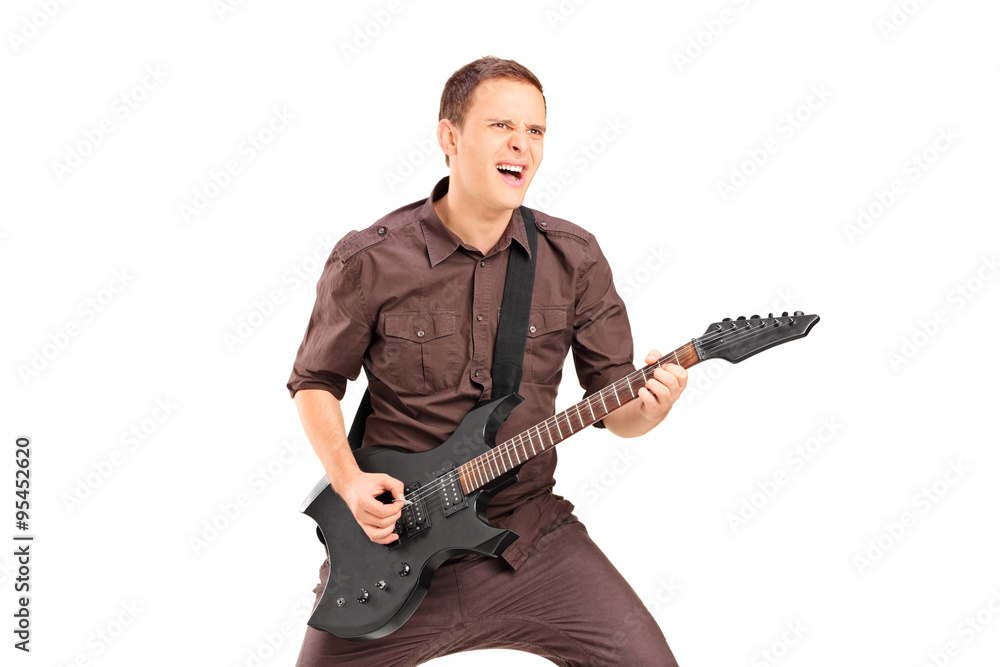 Excited man playing on electric guitar Excited man playing on electric guitar
