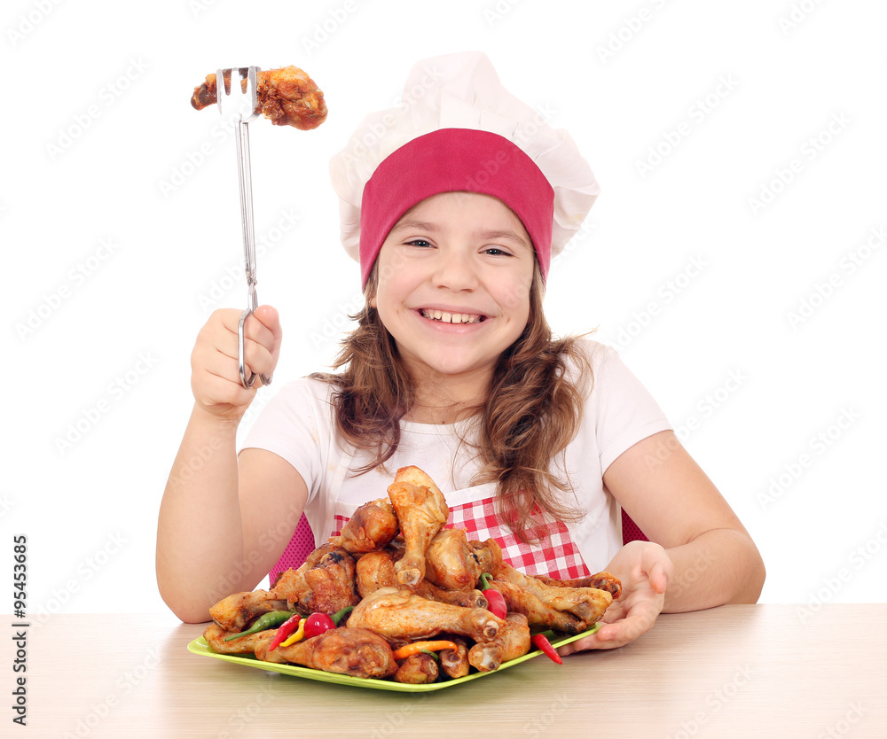 happy little girl cook with roasted chicken drumstick happy little girl cook with roasted chicken drumstick