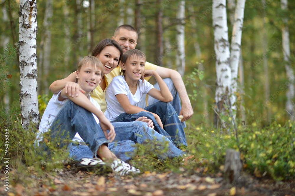 Family resting in summer park Family resting in summer park