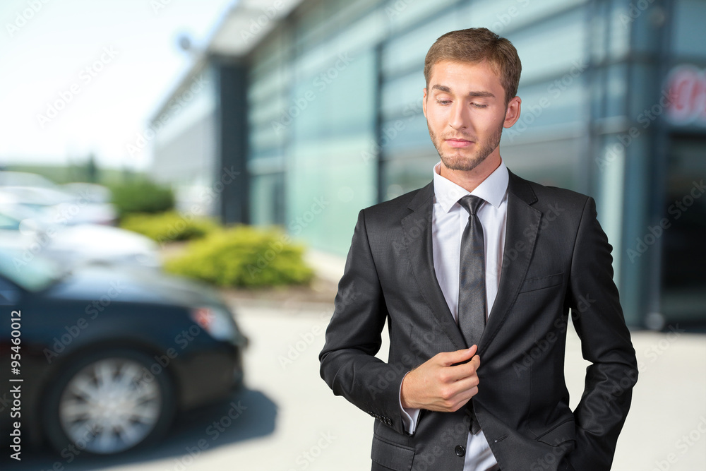 Confused young businessman thinking Confused young businessman thinking