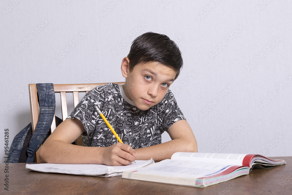 Young Boy Doing His Homework Young Boy Doing His Homework
