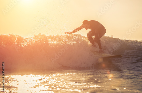 Young surfer practicing surf in Manhattan beach, california