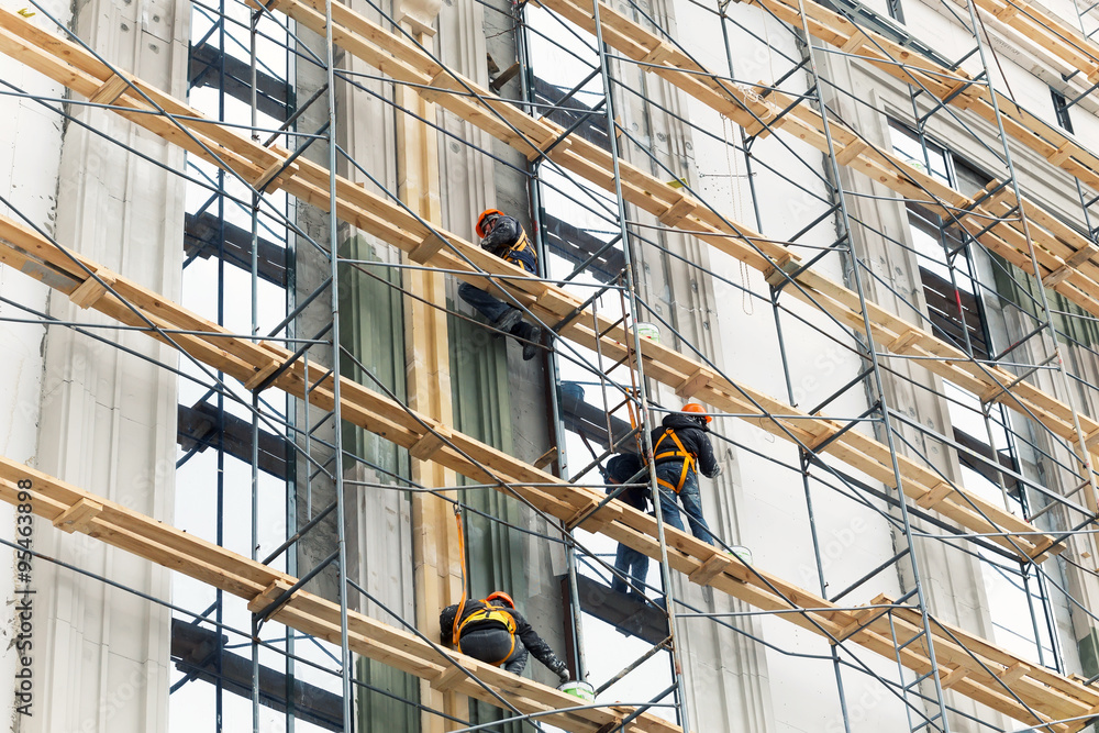 Fototapeta premium Building construction with scaffolding