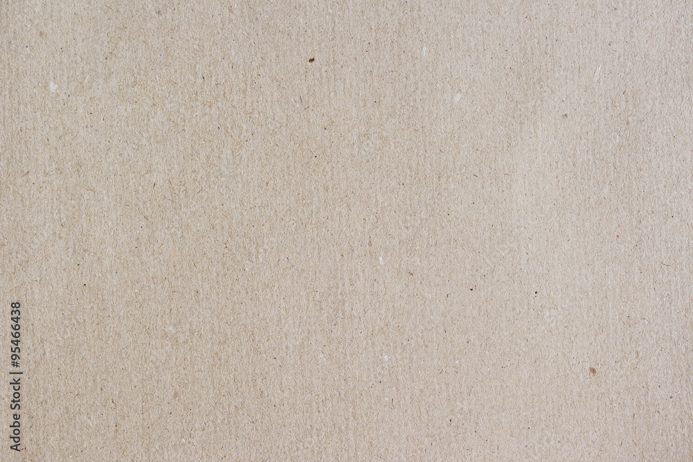 Carton texture. Beige paperboard sheet as background. Carton texture. Beige paperboard sheet as background.