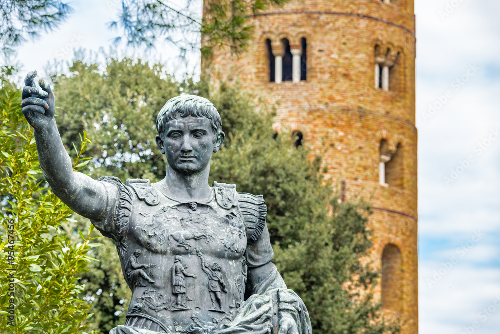 Fototapeta premium Caesar Augustus statue overlooking bell tower