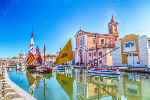 Church and boats on Canal Port