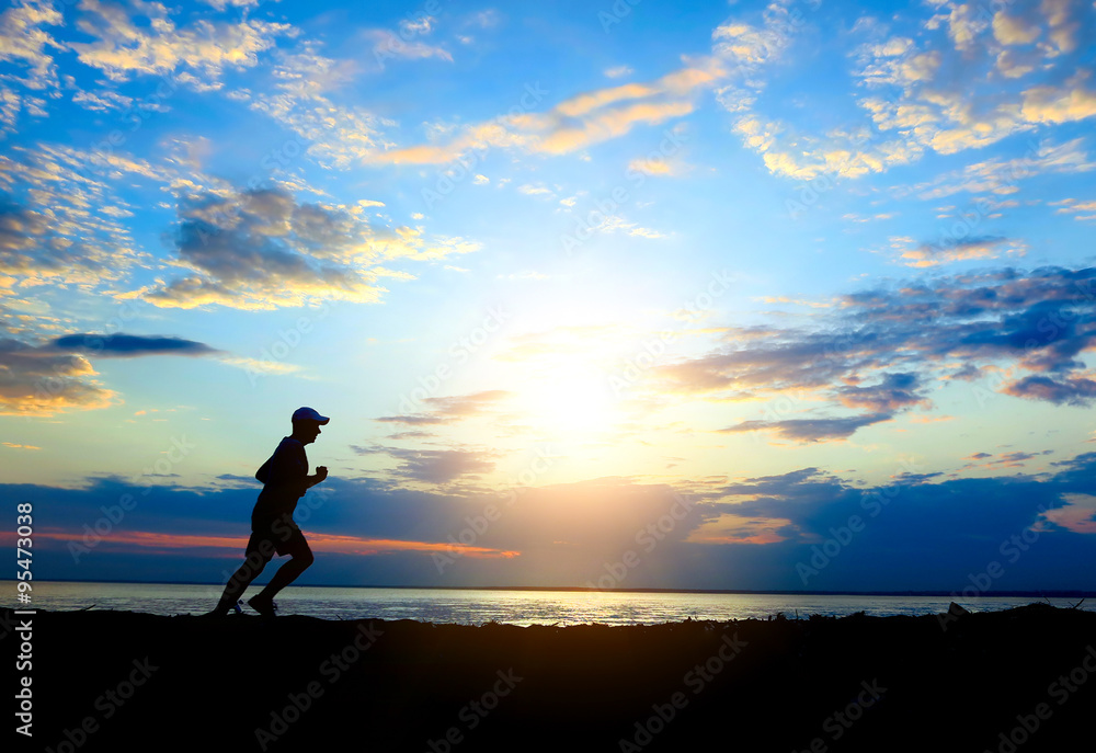 Fototapeta premium Man running at Sunset