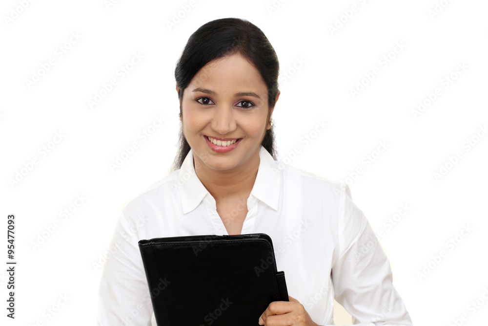 Young business woman holding a file Young business woman holding a file
