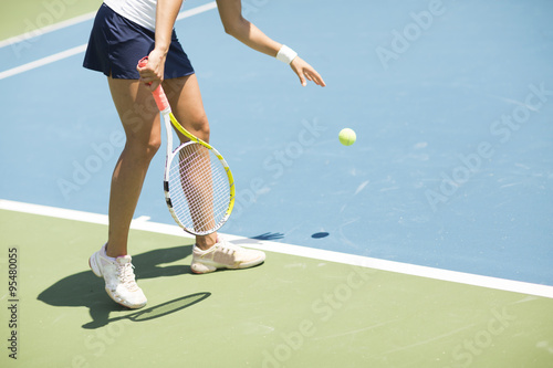 Young woman playing tennis