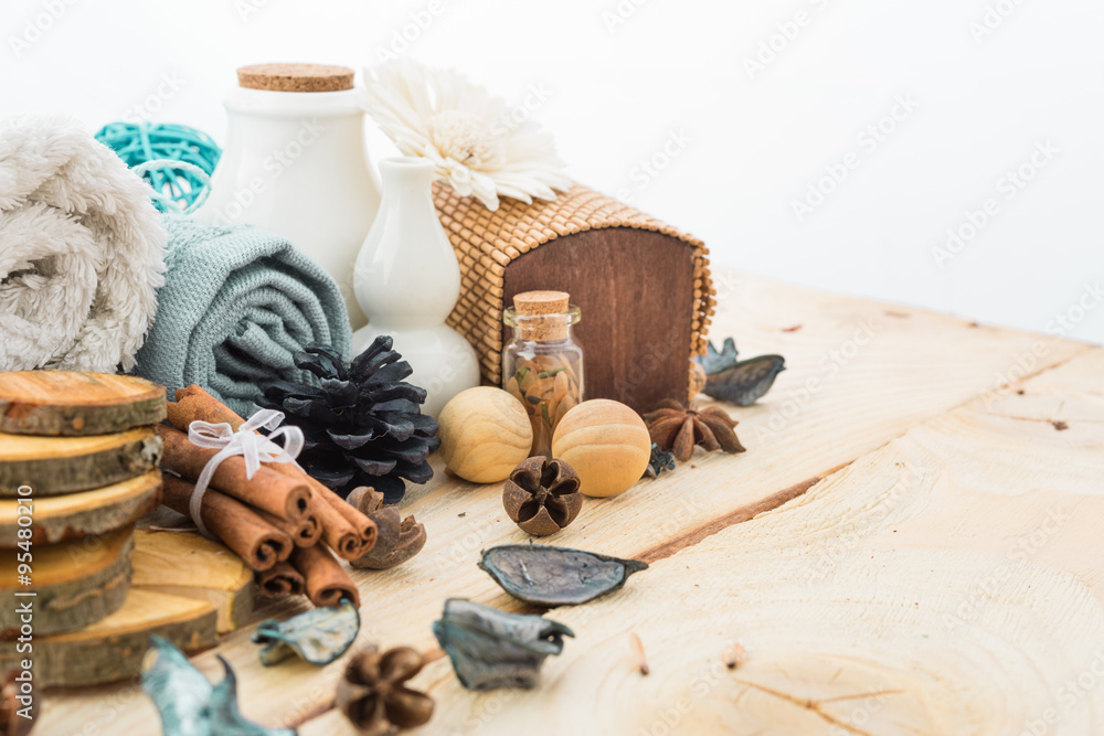 spa stuff, cinnamonand flower with towel on wood spa stuff, cinnamonand flower with towel on wood