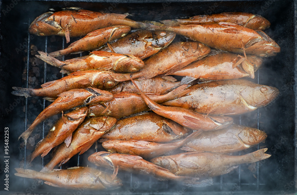 Fresh hot smoked fish on the grill Fresh hot smoked fish on the grill