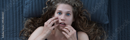 Tableau sur toile Woman scared after nightmare