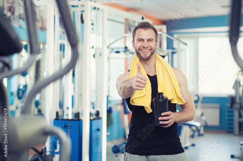 young man in sport gym club