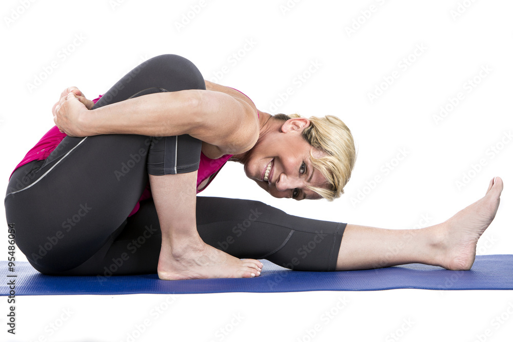 middle age woman doing yoga exercises middle age woman doing yoga exercises