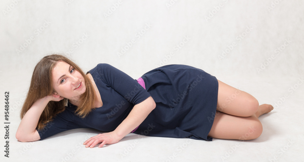 young girl in a dark blue dress young girl in a dark blue dress