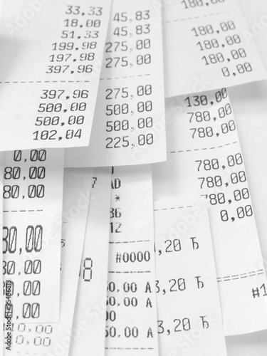 cash register receipts in a pile