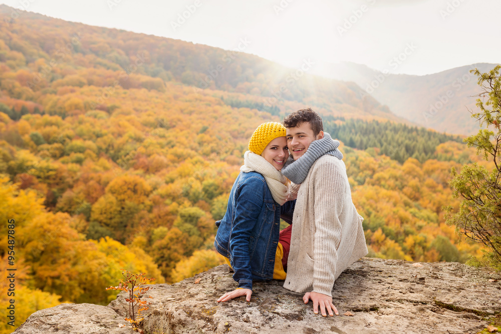 Beautiful couple in autumn nature