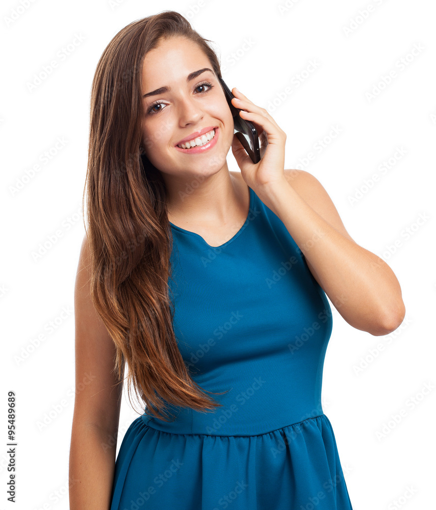 portrait of young woman wearing a dress talking with a mobile on portrait of young woman wearing a dress talking with a mobile on