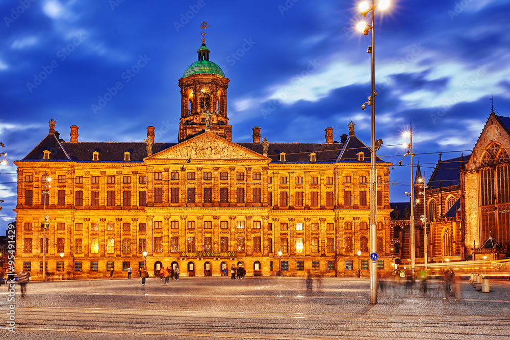 Royal Palace in Amsterdam on the Dam Square in the evening. Neth