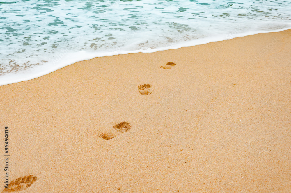 Footprints in the sea sandy beach on a vacation time in Phuket, Footprints in the sea sandy beach on a vacation time in Phuket,