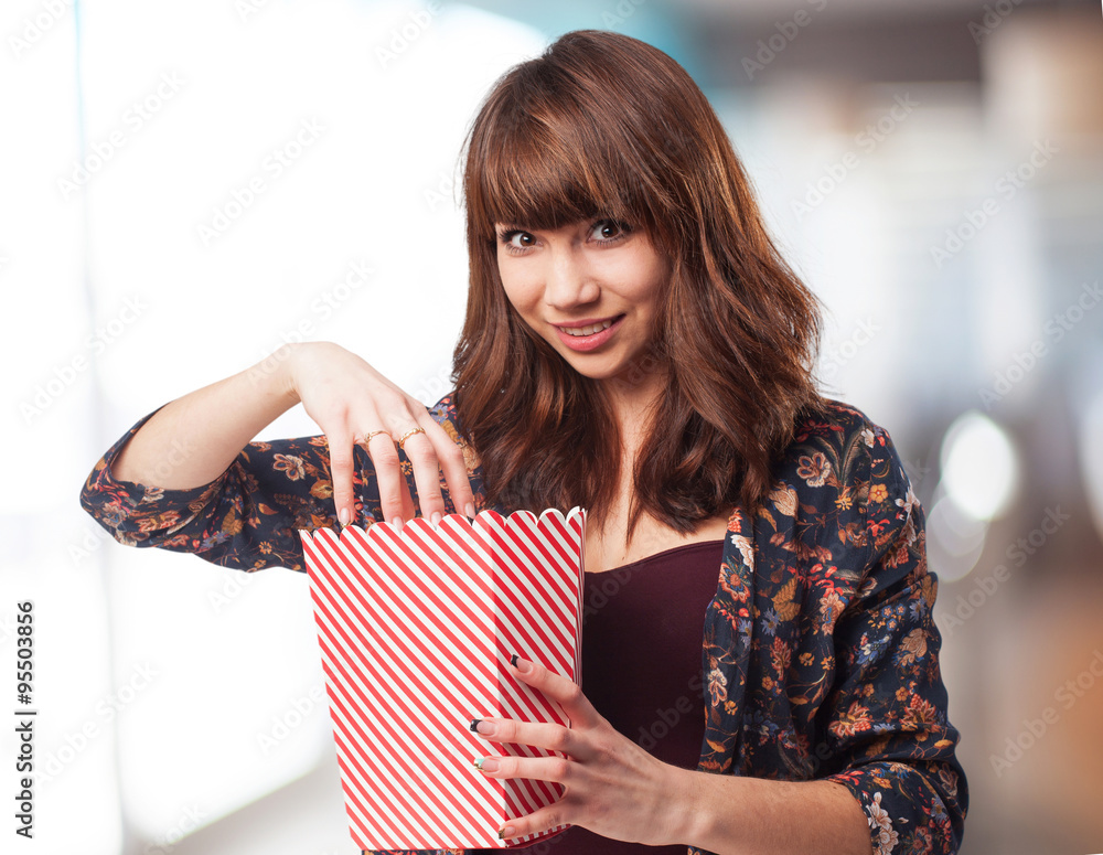 woman eating popcorns woman eating popcorns