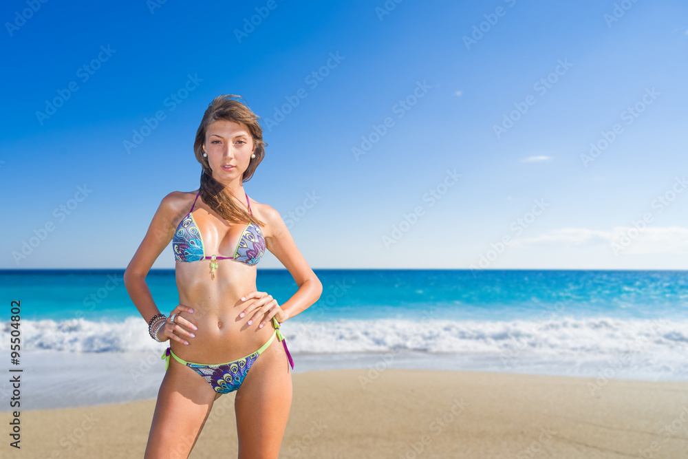 Fototapeta premium sexy woman in bikini at the beach