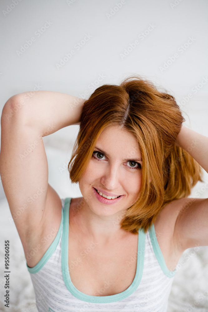 Portrait of beautiful red-haired girl face closeup Portrait of beautiful red-haired girl face closeup