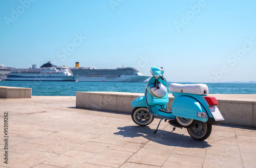 Blue scooter on the waterfront