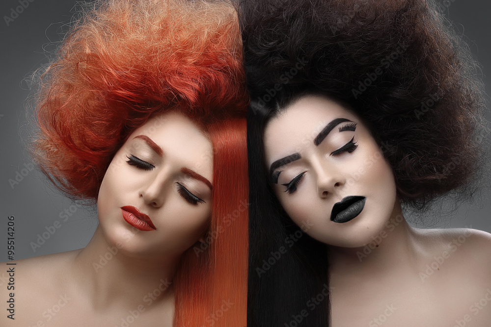 Portrait of two royoung beautiful girls, redhead and brunette womans with clean skin, half of their hair smooth other half curly stranded Portrait of two royoung beautiful girls, redhead and brunette womans with clean skin, half of their hair smooth other half curly stranded