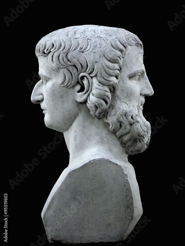 Janus sculpture on a black background. Marble bust of the mythological god of the Summer Garden of Saint Petersburg