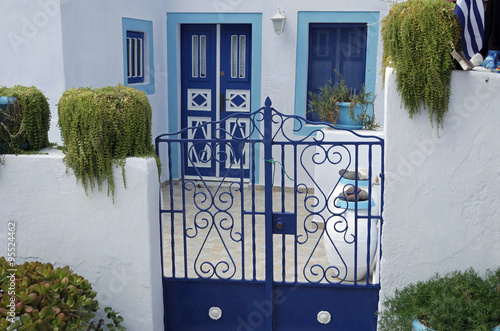 door in small greece village exo gonia on santorini photo